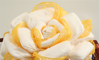 Immagine di Torta di Pannolini Fiore Rosa Gialla